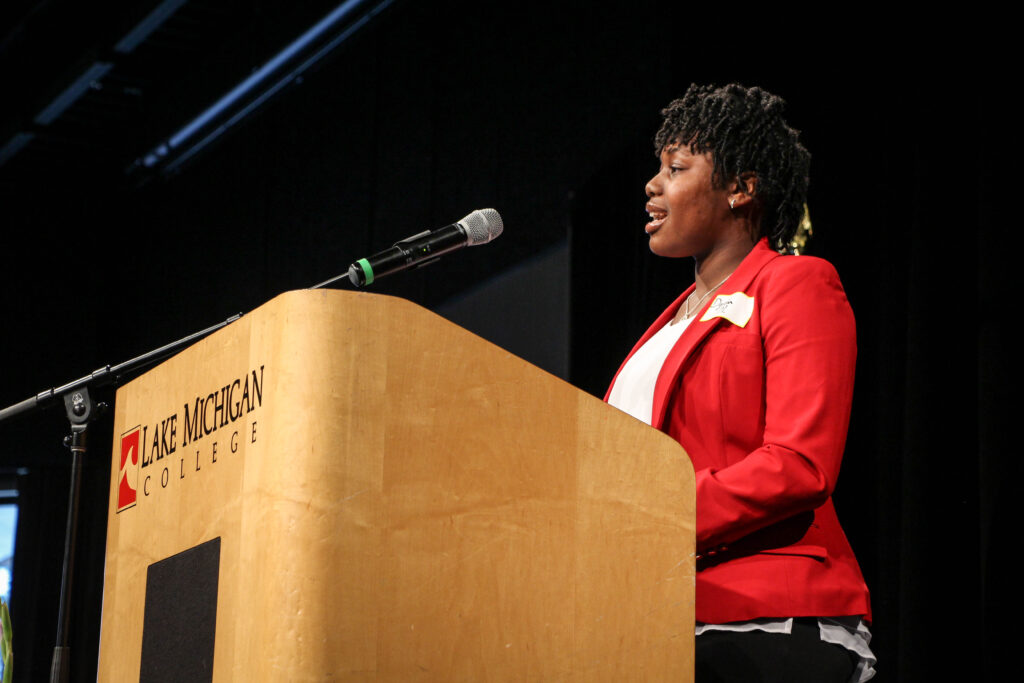 Woman speaking at podium