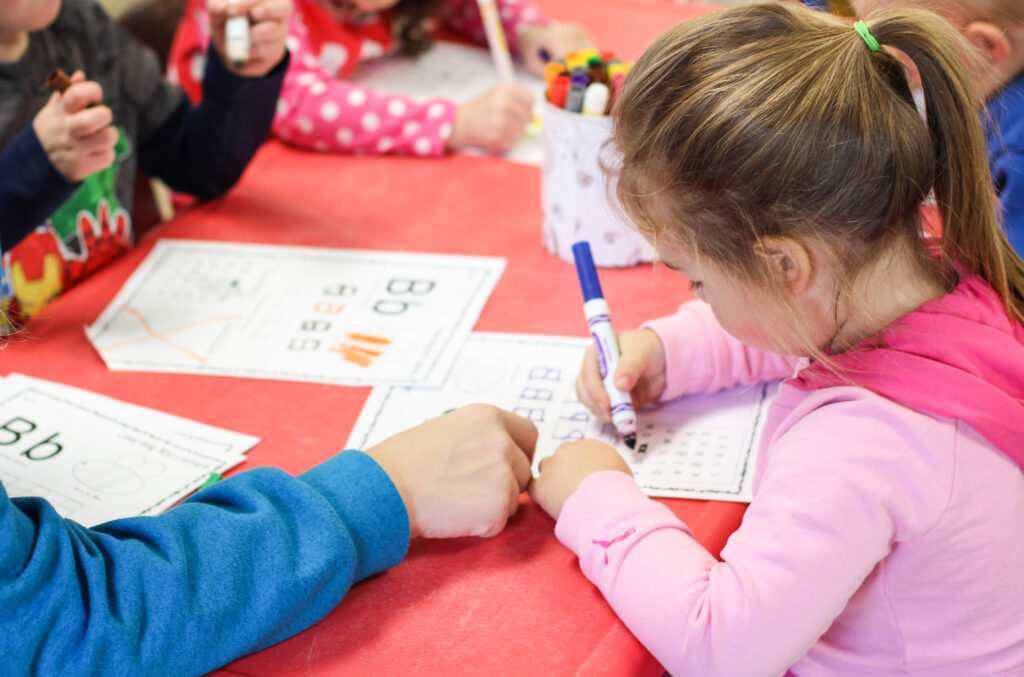 Children doing homework together.