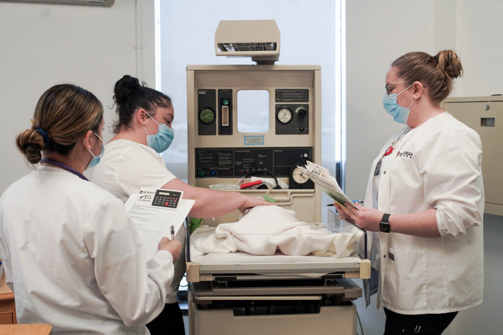 A group of nurses training together.