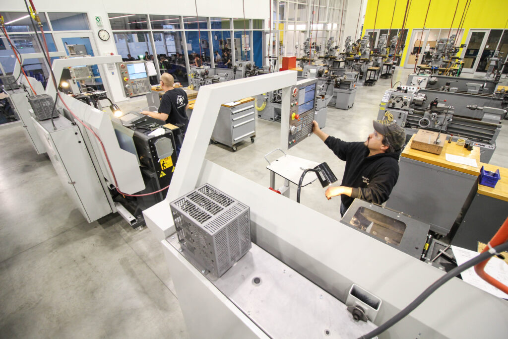 People working on a manufacturing floor
