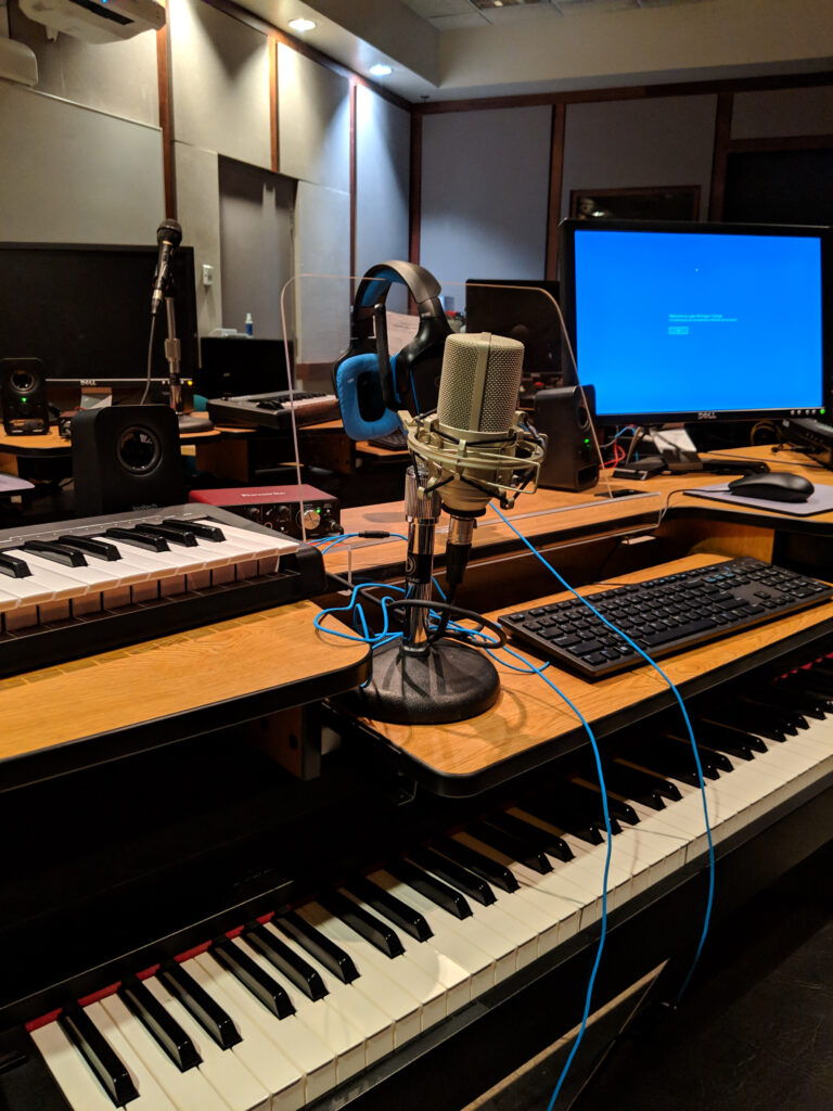 Sound booth with mic and keyboards